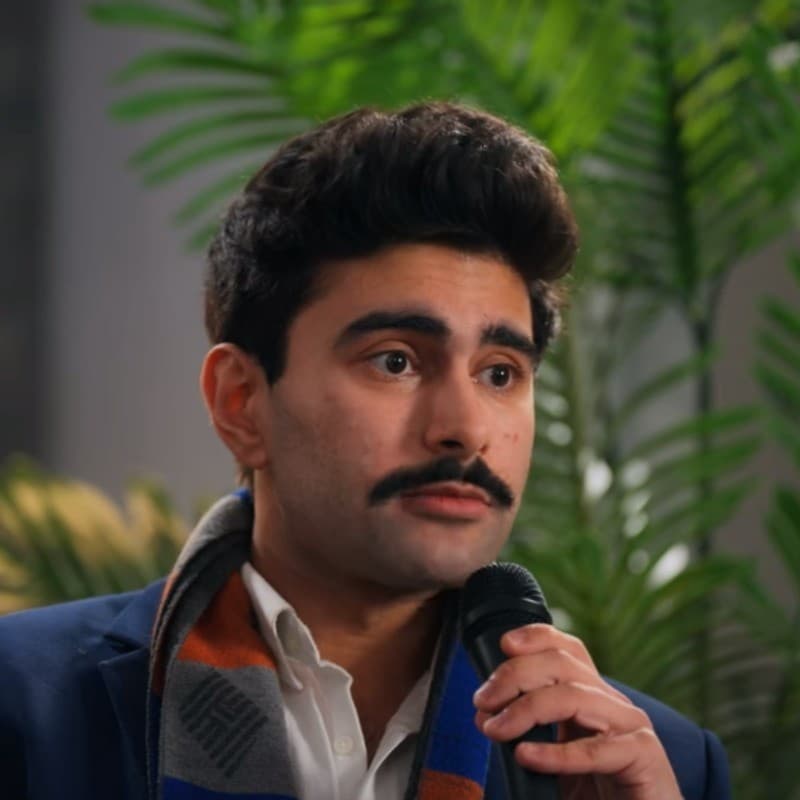 Asfandyar Khan - Duke CEO Keynote Speaker Enterprise AI Asfandyar Khan Duke CEO Shuffle speaking with microphone keynote presentation on enterprise AI and computer vision